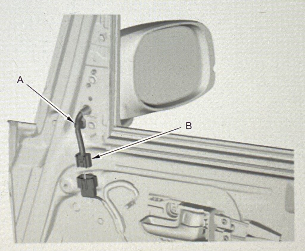 サイドミラーハーネスの接続を外している図